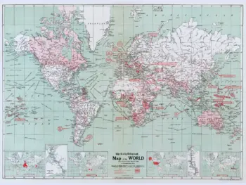 The Daily Telegraph world map circa 1918 by Alexander Gross, with blue oceans, red World War I annotations, and colonial territory and canal insets.